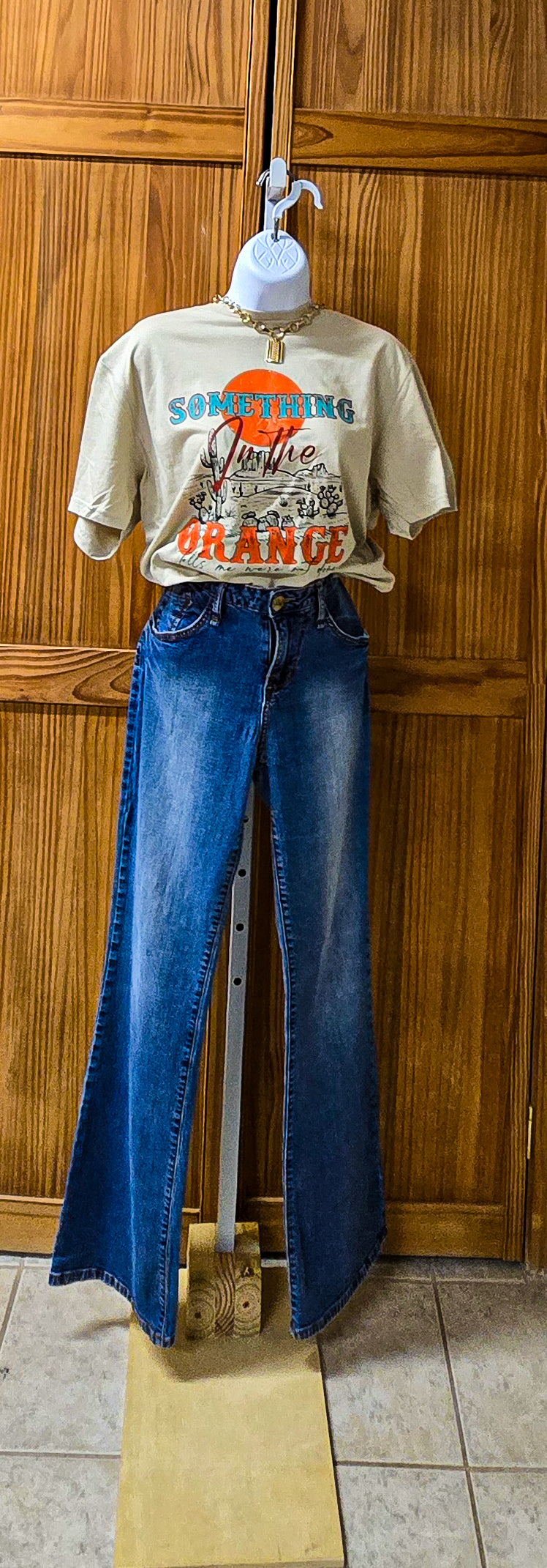Something in the orange graphic Tee