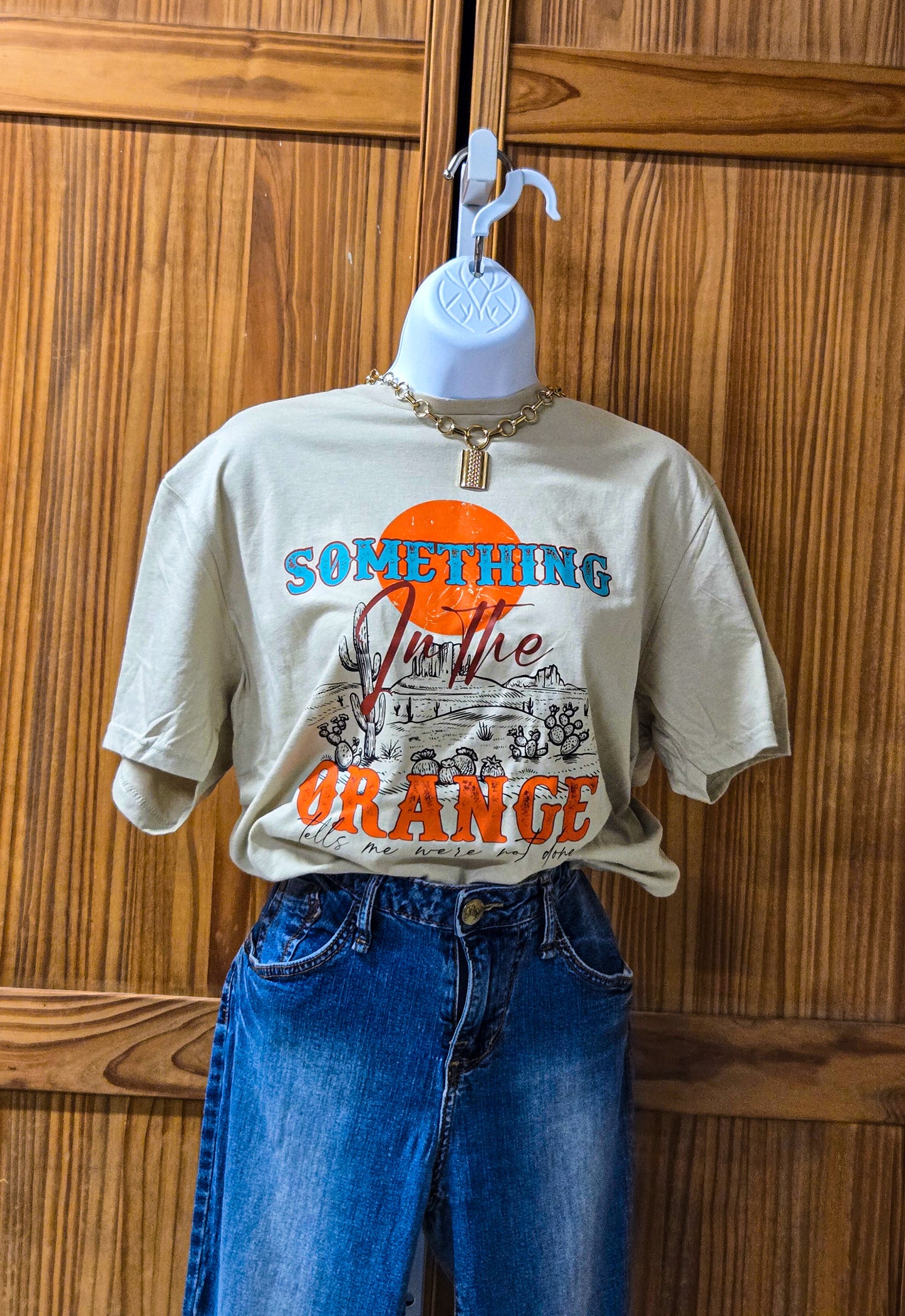 Something in the orange graphic Tee
