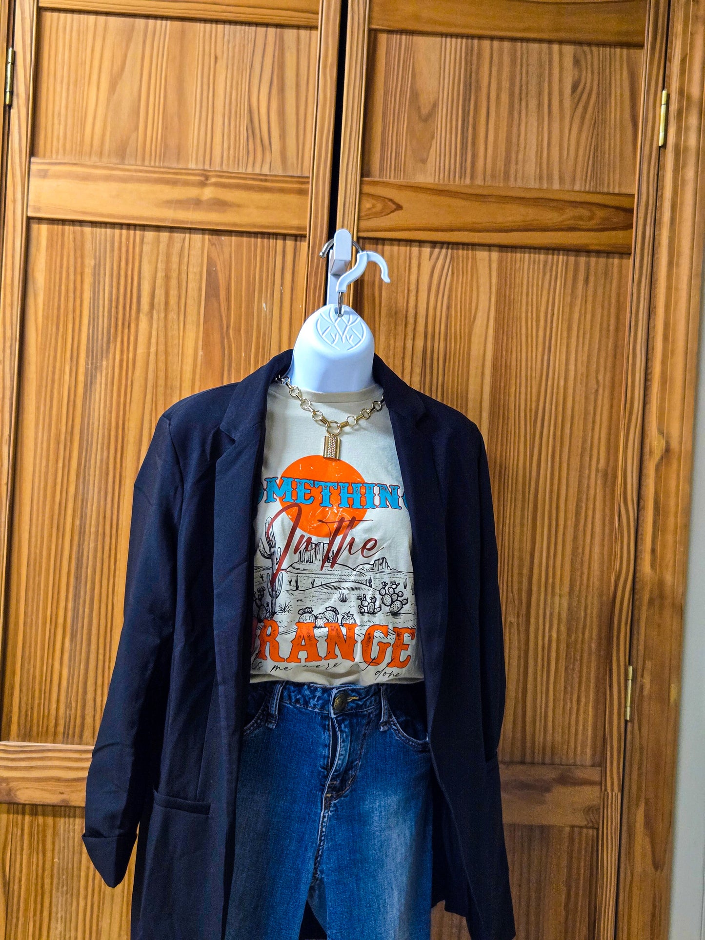Something in the orange graphic Tee