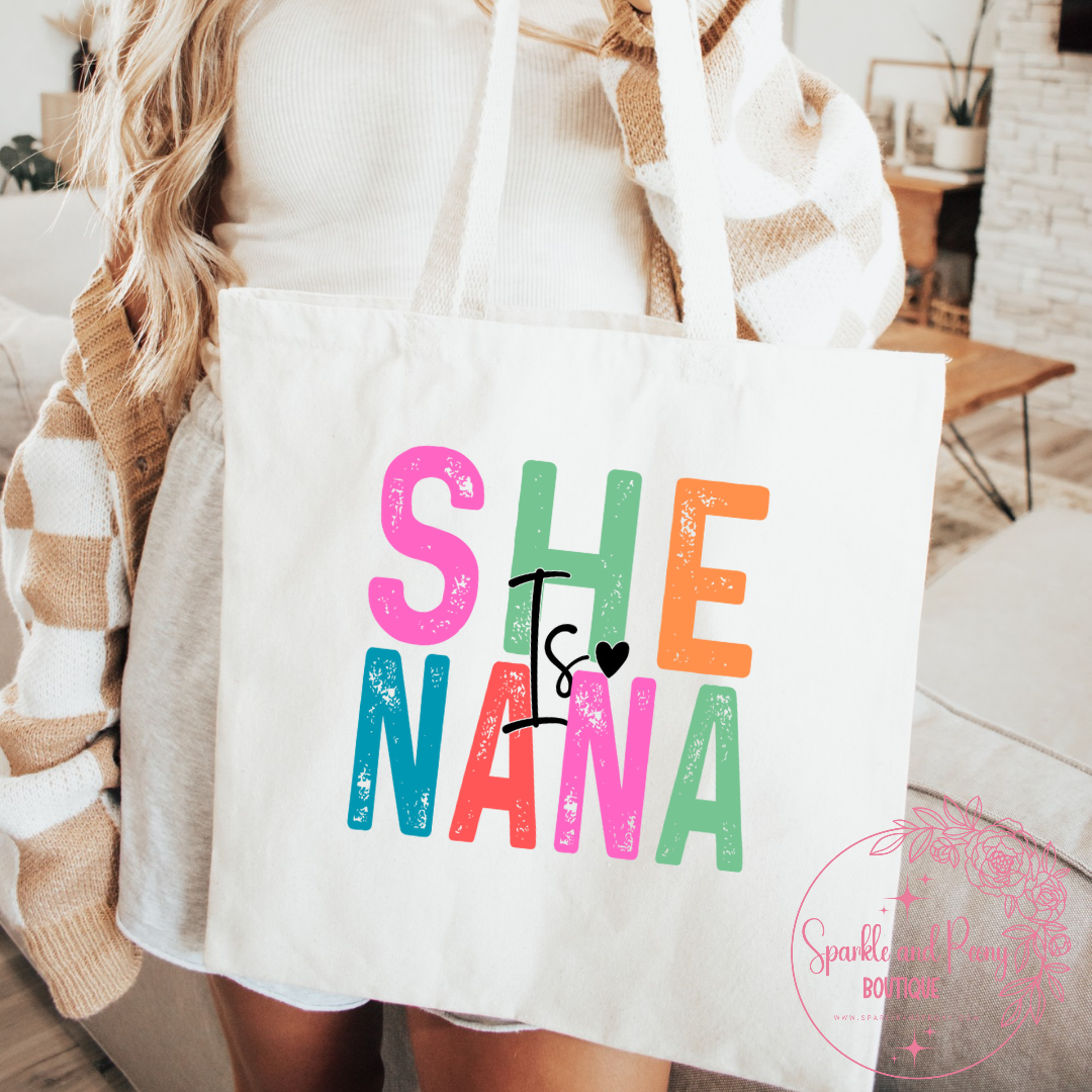 She is _______ canvas tote bag