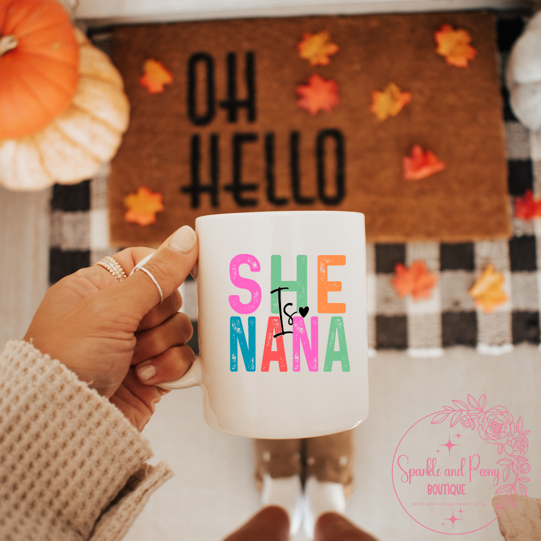 She is ______ coffee mug