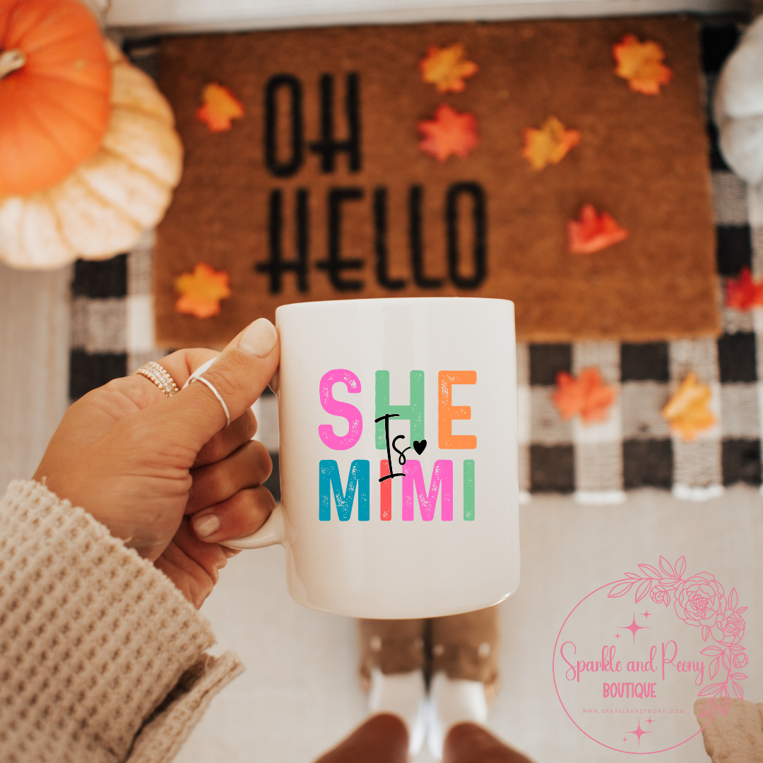 She is ______ coffee mug