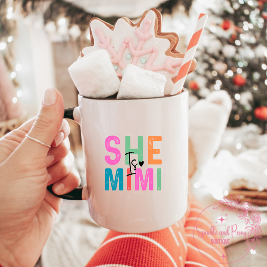 She is ______ coffee mug