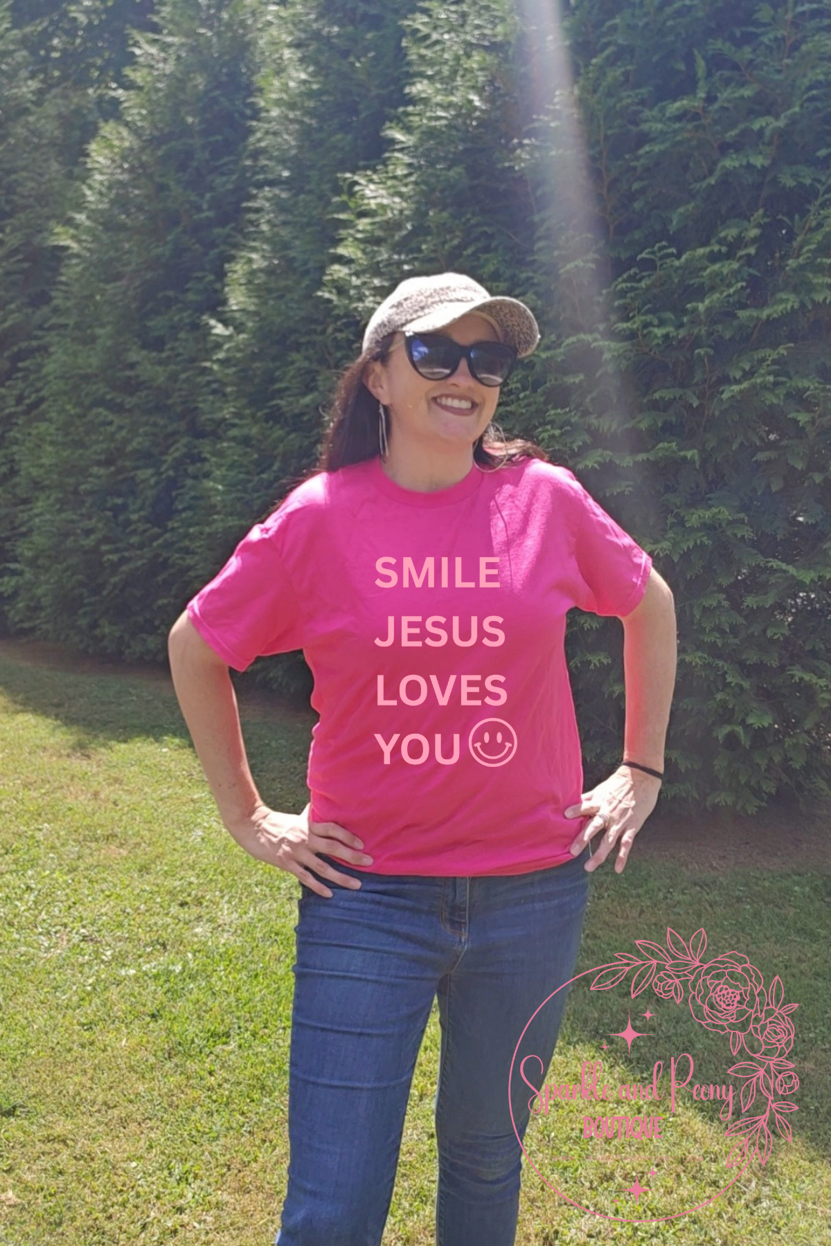 smile Jesus loves you graphic tee in hot pink
