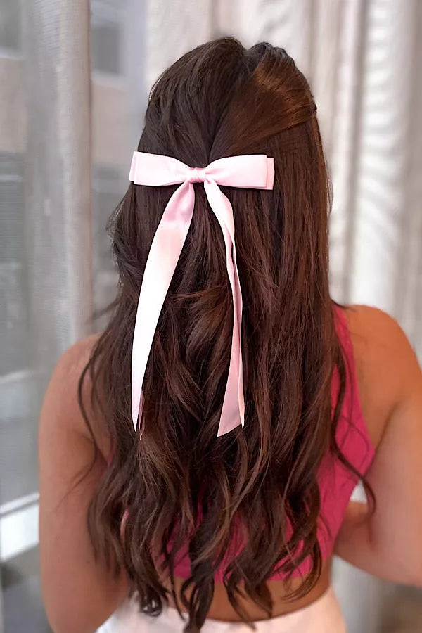 Take a bow satin hair bow in baby pink