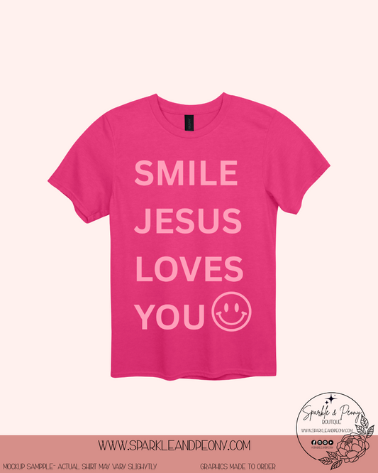 smile Jesus loves you graphic tee in hot pink